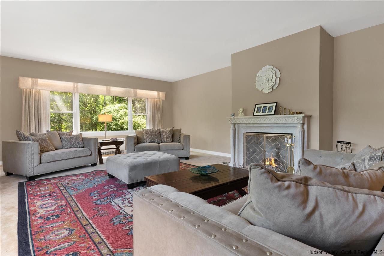 295 Game Farm Road Catskill, NY 12414 - Photo 6 of 35 a living room with furniture and a fireplace