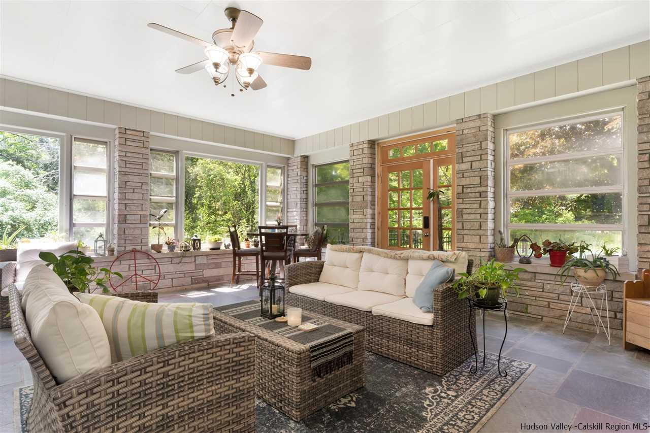 295 Game Farm Road Catskill, NY 12414 - Photo 7 of 35 a living room with furniture and large windows