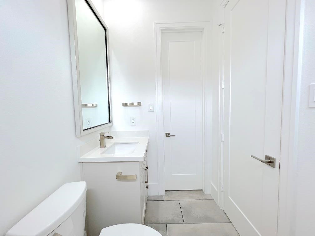 2122 Blalock Road, Unit B Houston, TX 77080 - Photo 28 of 45 a bathroom with a sink a toilet and shower