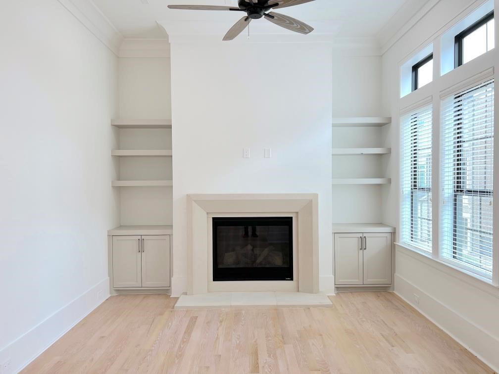 2122 Blalock Road, Unit B Houston, TX 77080 - Photo 6 of 45 a living room with a fireplace and a window