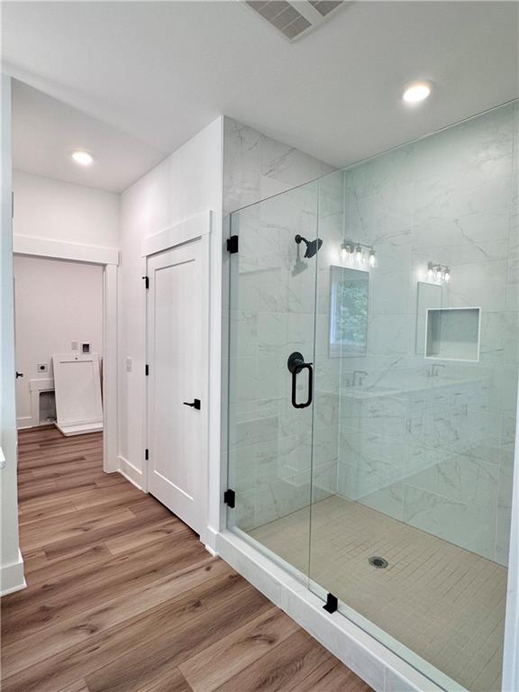 6312 Woodstock Road Acworth, GA 30102 - Photo 22 of 44 a bathroom with a shower