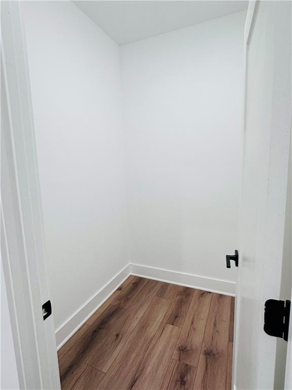 6312 Woodstock Road Acworth, GA 30102 - Photo 28 of 44 a view of a room with wooden floor