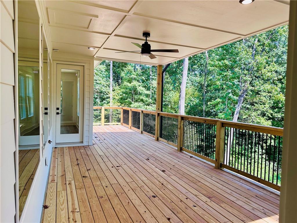 6312 Woodstock Road Acworth, GA 30102 - Photo 30 of 44 a view of a porch with wooden floor