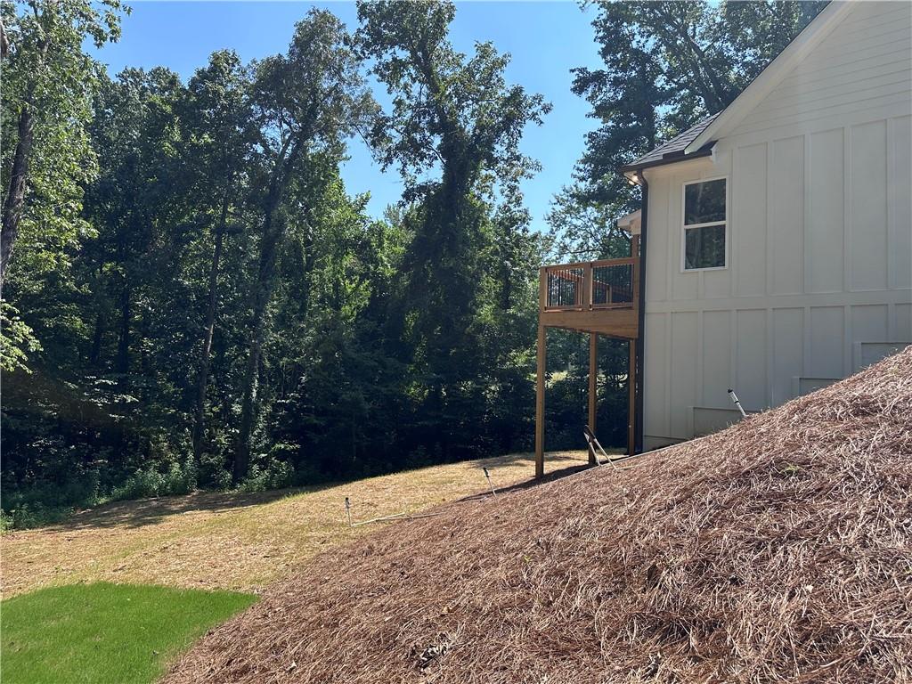 6312 Woodstock Road Acworth, GA 30102 - Photo 37 of 44 a view of a backyard of the house