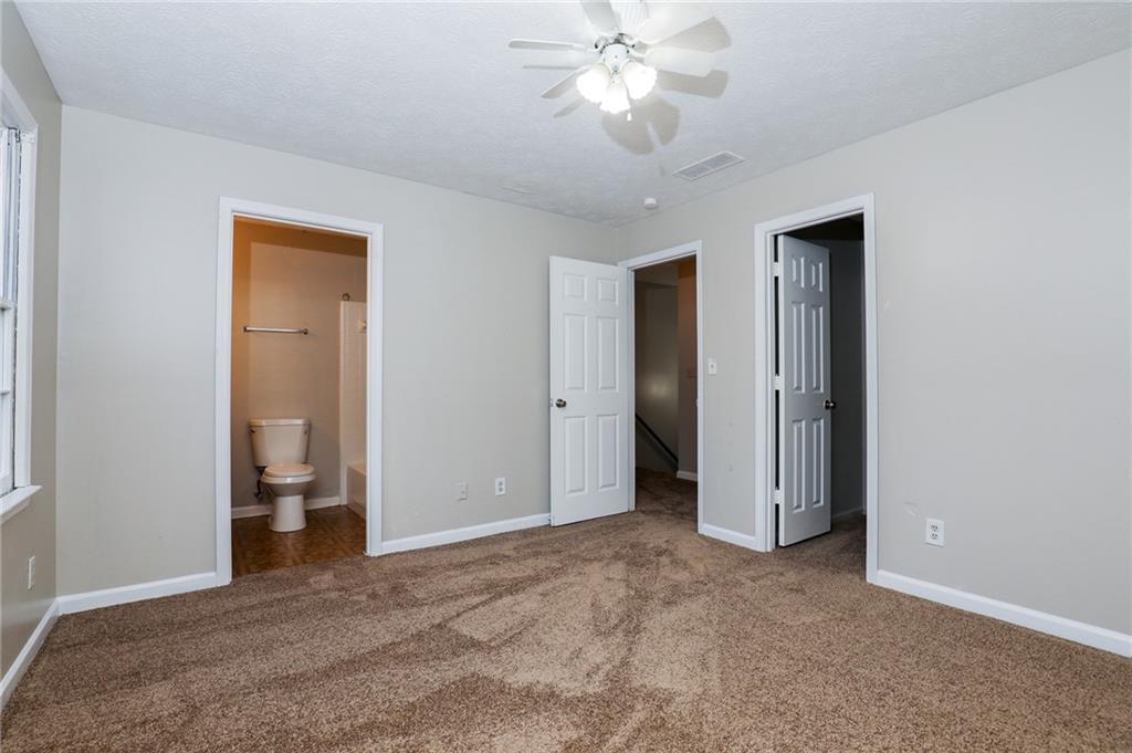 5299 Weyden Court, Unit A Norcross, GA 30071 - Photo 4 of 14 a view of an empty room and a bathroom
