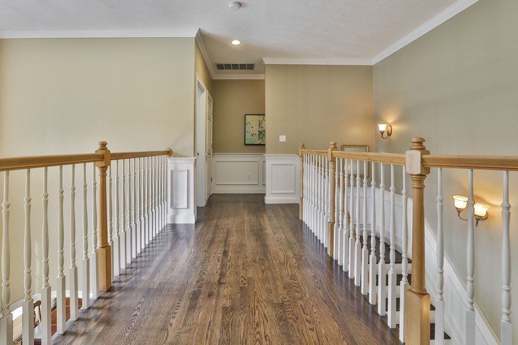 14 Collins Road Berlin, MA 01503 - Photo 23 of 42 a view of a hallway with wooden floor and staircase