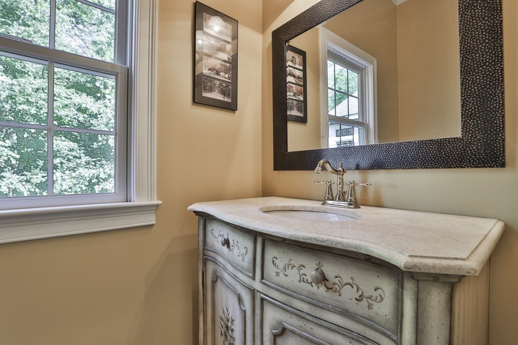 14 Collins Road Berlin, MA 01503 - Photo 8 of 42 a bath room with a sink and a window