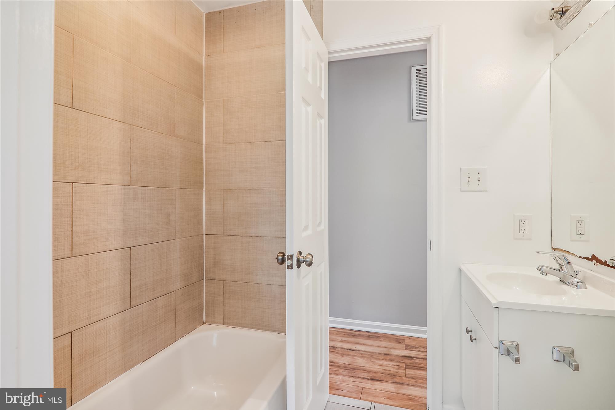 4612 Calvert Road College Park, MD 20740 - Photo 11 of 17 a bathroom with a bathtub and shower