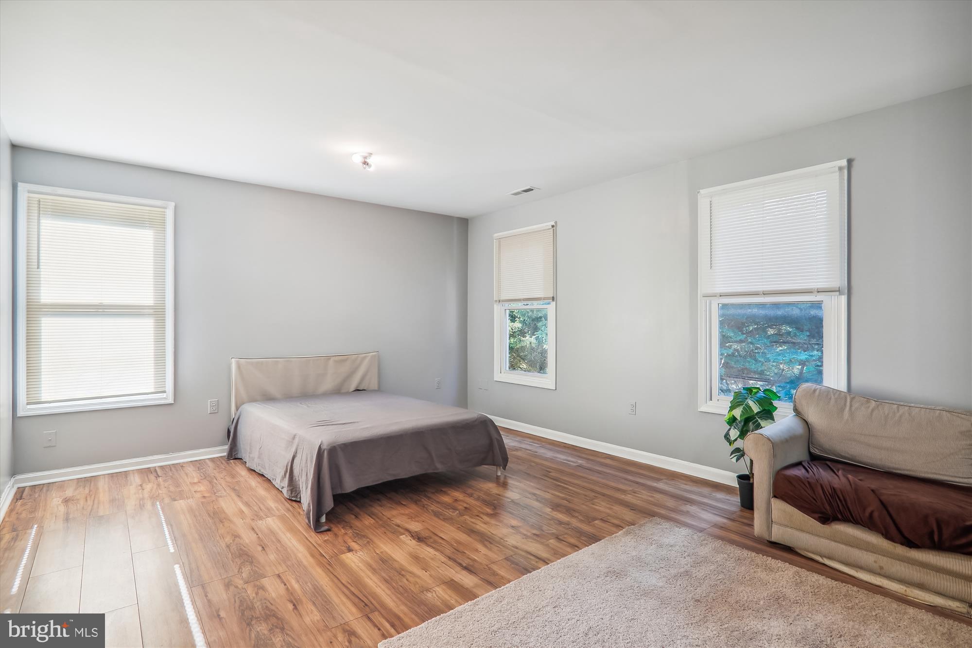 4612 Calvert Road College Park, MD 20740 - Photo 16 of 17 a living room with a bed furniture and a window