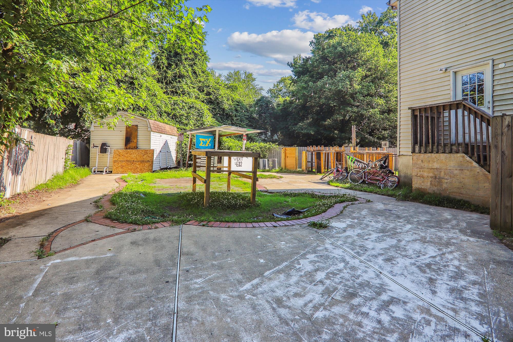 4612 Calvert Road College Park, MD 20740 - Photo 3 of 17 a view of a house with a yard and tree s