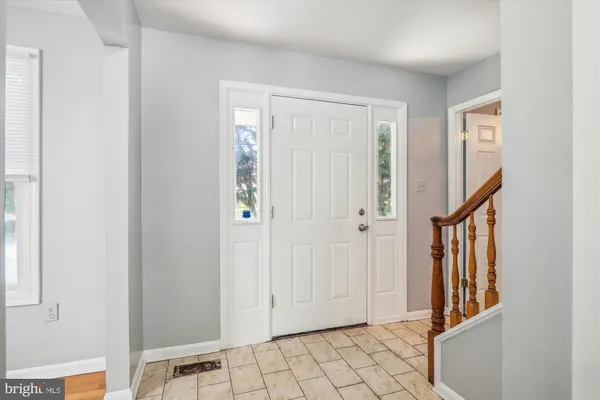 a view of an entryway with staircase