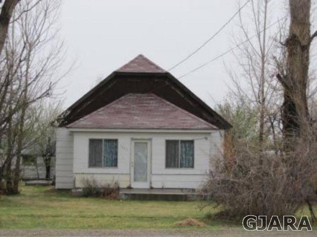 3647 G Road Palisade, CO 81526 - Photo 1 of 1 a front view of a house with a garden