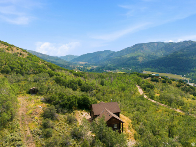 5404 Mountain View Road Coalville, UT 84017 - Photo 45 of 50 Property situated on a hillside with mountain scenery, surrounded by extensive natural vegetation and trees