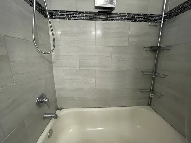 a storage room with a washer and dryer