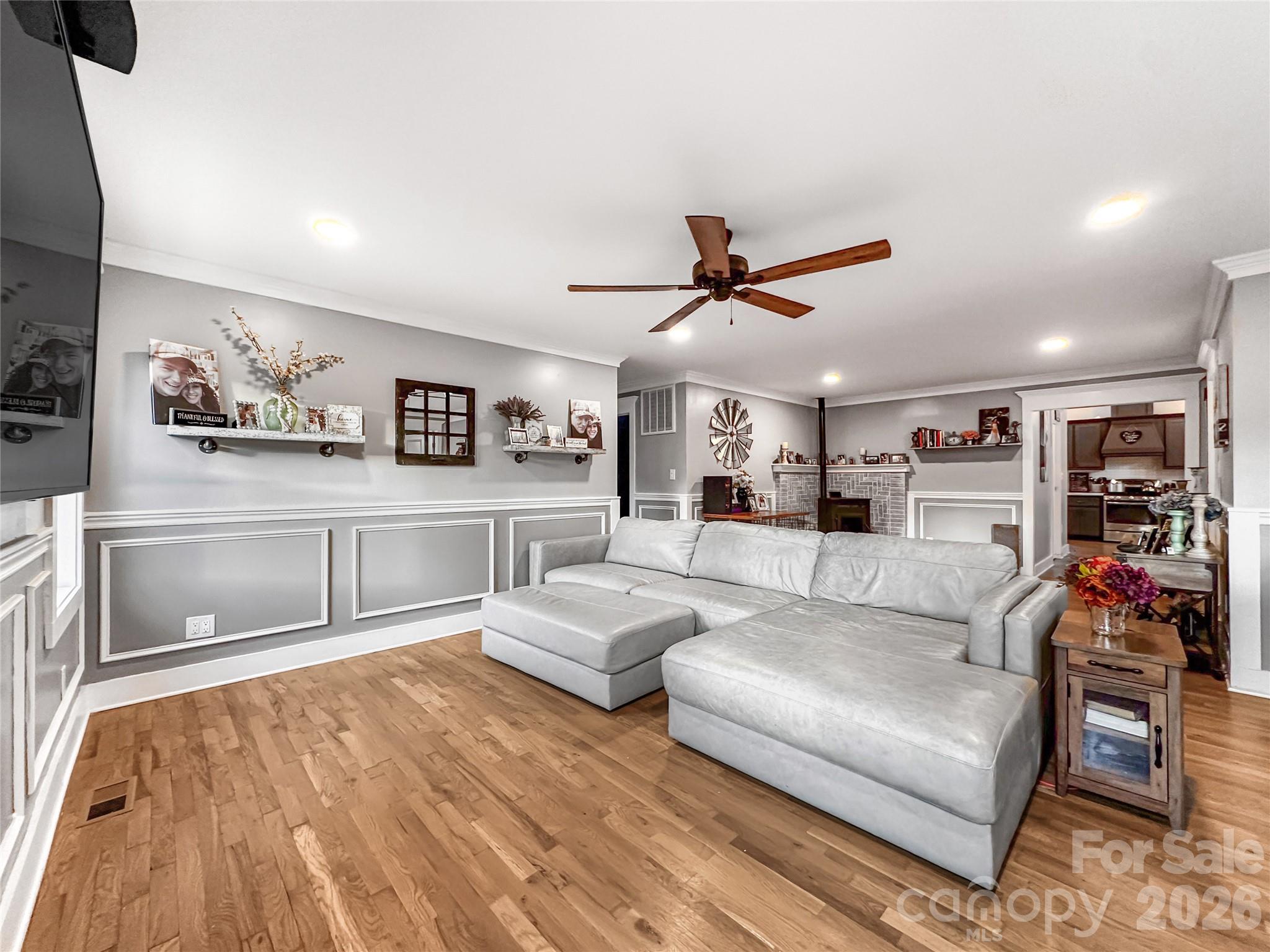 4386 Rocky Road Lenoir, NC 28645 - Photo 13 of 43 a living room with furniture and a wooden floor