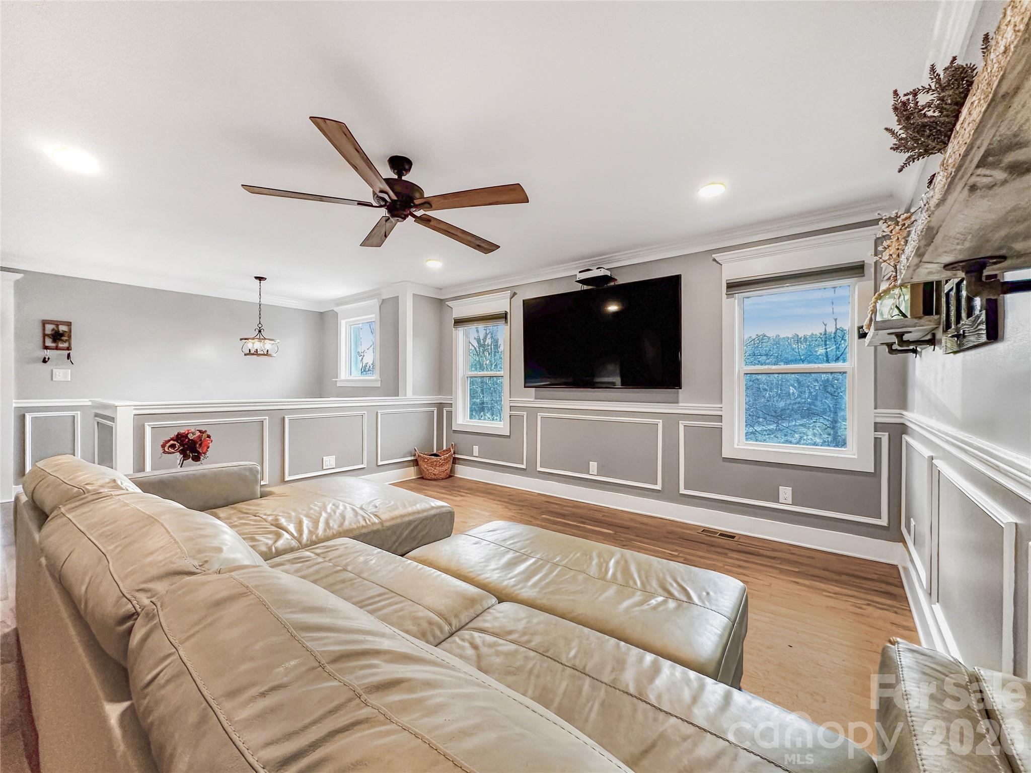 4386 Rocky Road Lenoir, NC 28645 - Photo 15 of 43 a living room with furniture and a flat screen tv