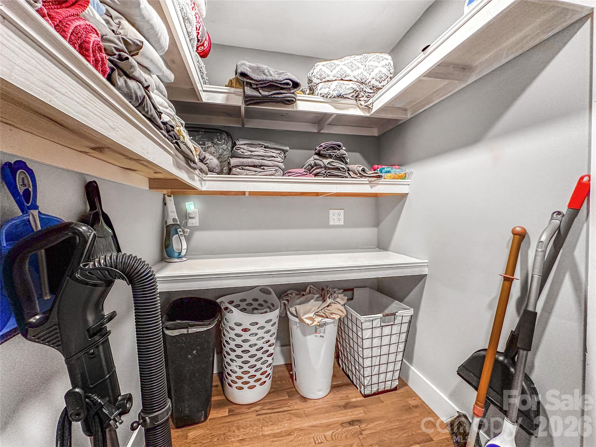 4386 Rocky Road Lenoir, NC 28645 - Photo 23 of 43 a view of water heater room with wooden floor
