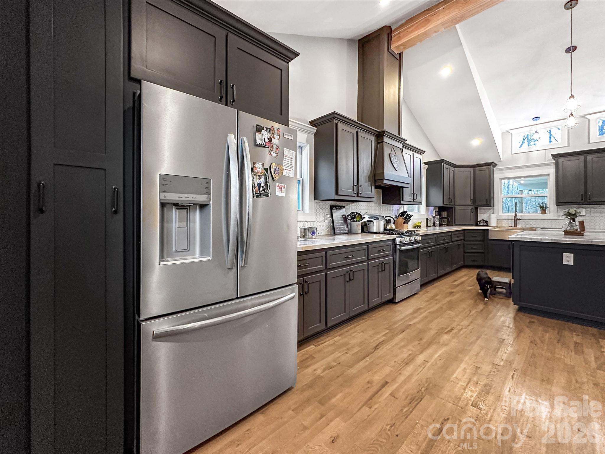 4386 Rocky Road Lenoir, NC 28645 - Photo 27 of 43 a kitchen with stainless steel appliances a refrigerator and a sink