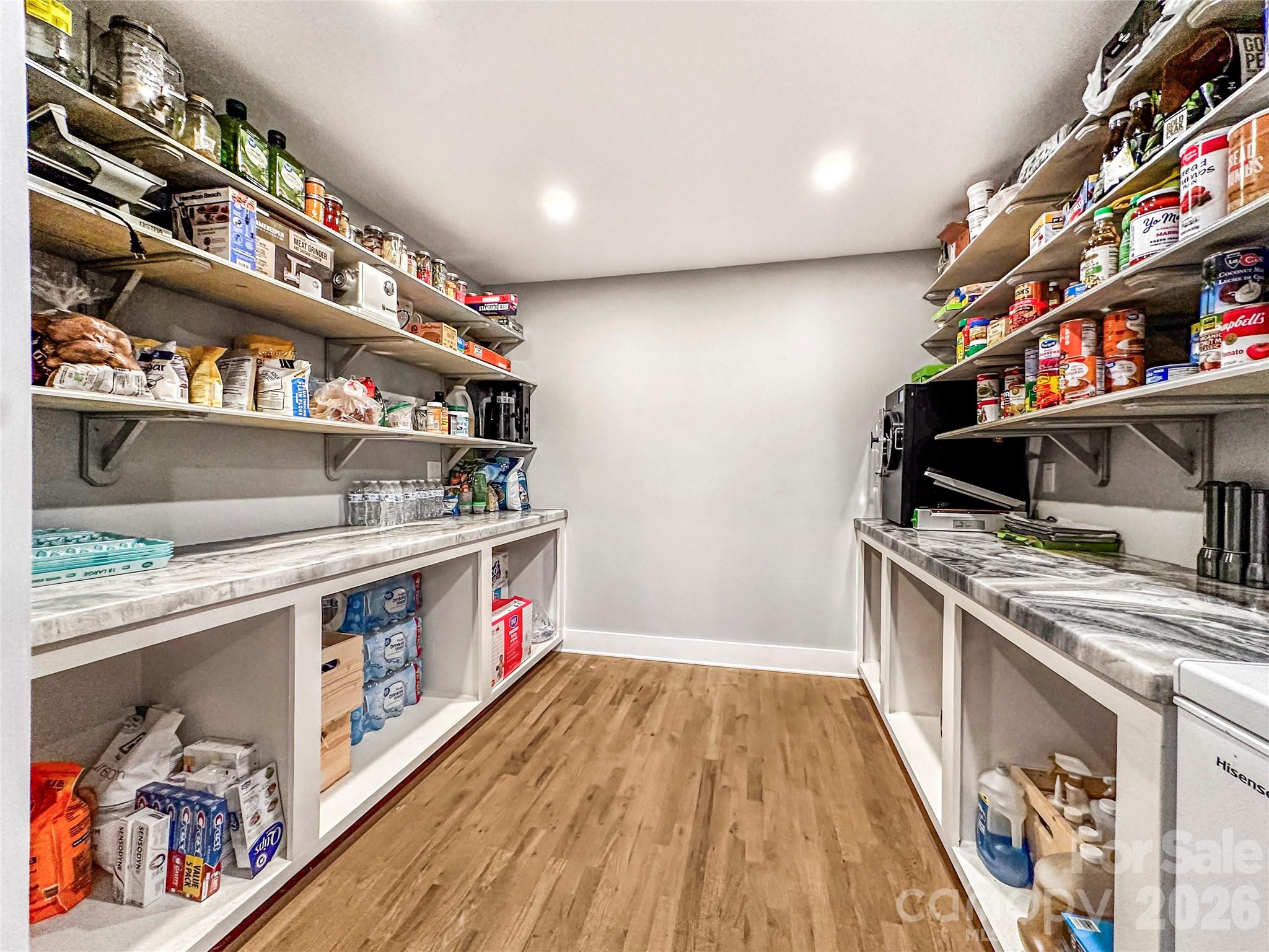 4386 Rocky Road Lenoir, NC 28645 - Photo 30 of 43 a kitchen with stainless steel appliances granite countertop a stove and cabinets