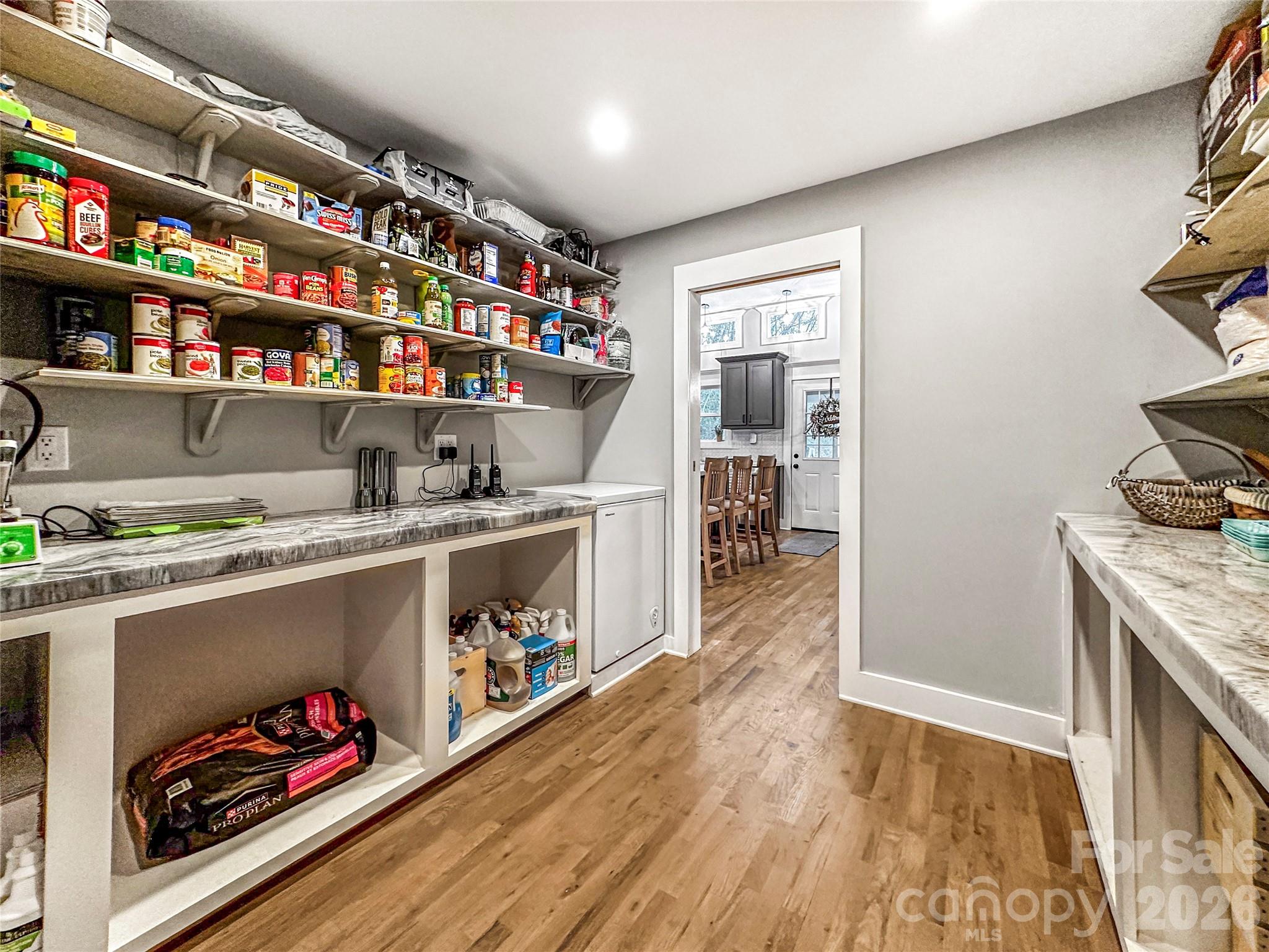 4386 Rocky Road Lenoir, NC 28645 - Photo 31 of 43 a kitchen with stainless steel appliances granite countertop a stove and a refrigerator