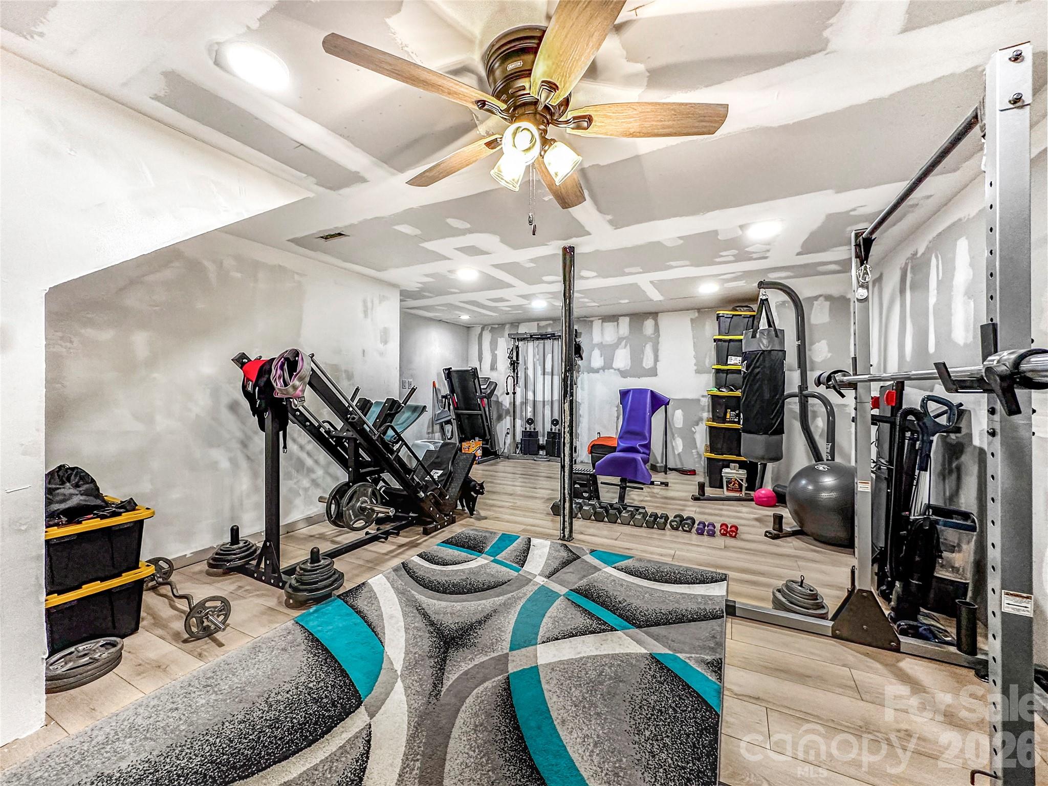 4386 Rocky Road Lenoir, NC 28645 - Photo 37 of 43 a view of a room with gym equipment