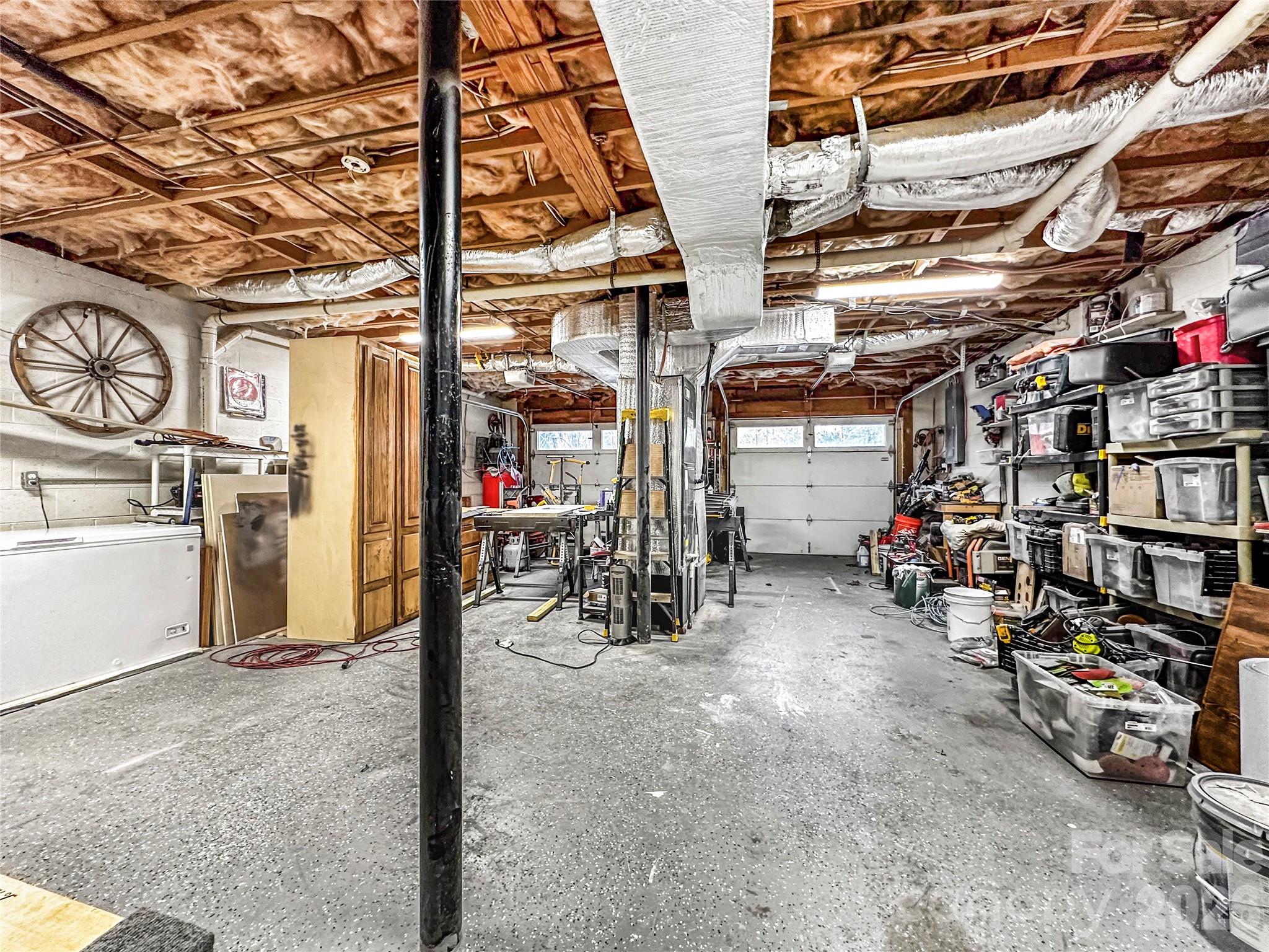 4386 Rocky Road Lenoir, NC 28645 - Photo 39 of 43 a view of a storage room with bicycles