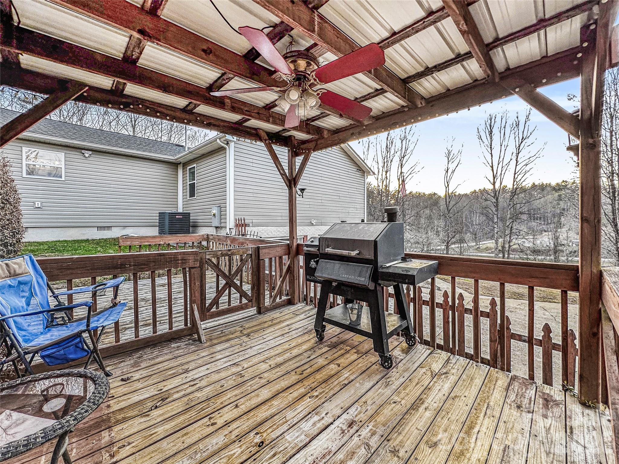4386 Rocky Road Lenoir, NC 28645 - Photo 43 of 43 a view of a chairs and table on the wooden floor