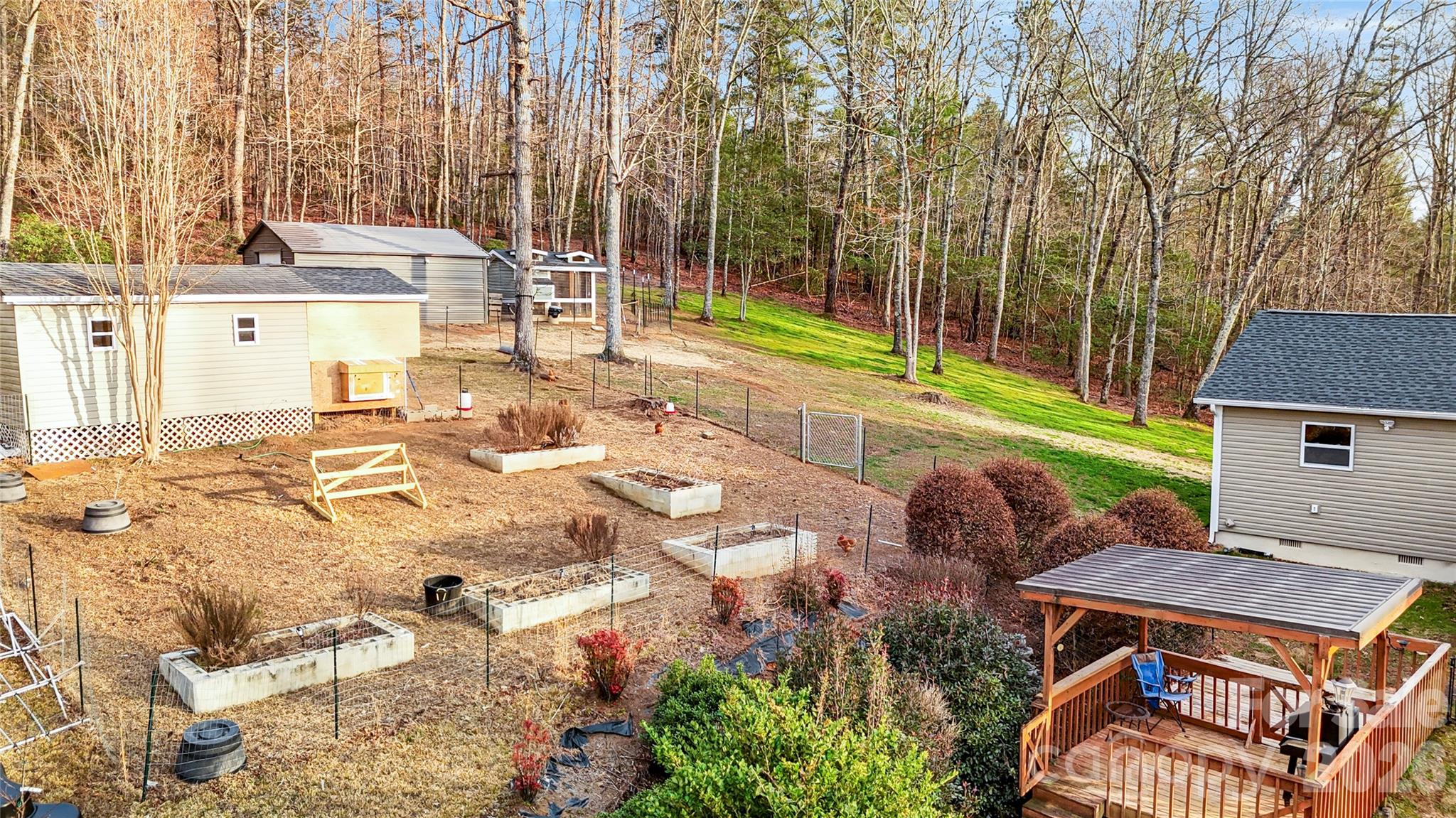 4386 Rocky Road Lenoir, NC 28645 - Photo 10 of 43 aerial view of a house with garden and trees