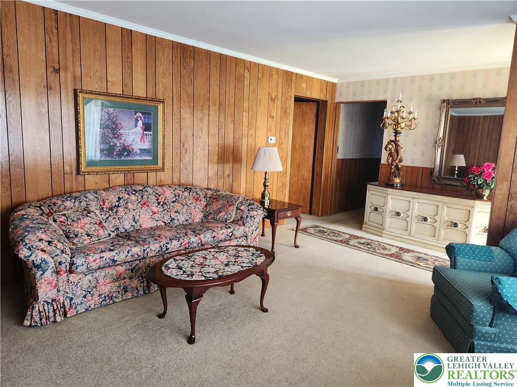 90 Porter Street Nazareth, PA 18064 - Photo 2 of 19 a living room with furniture and a flat screen tv