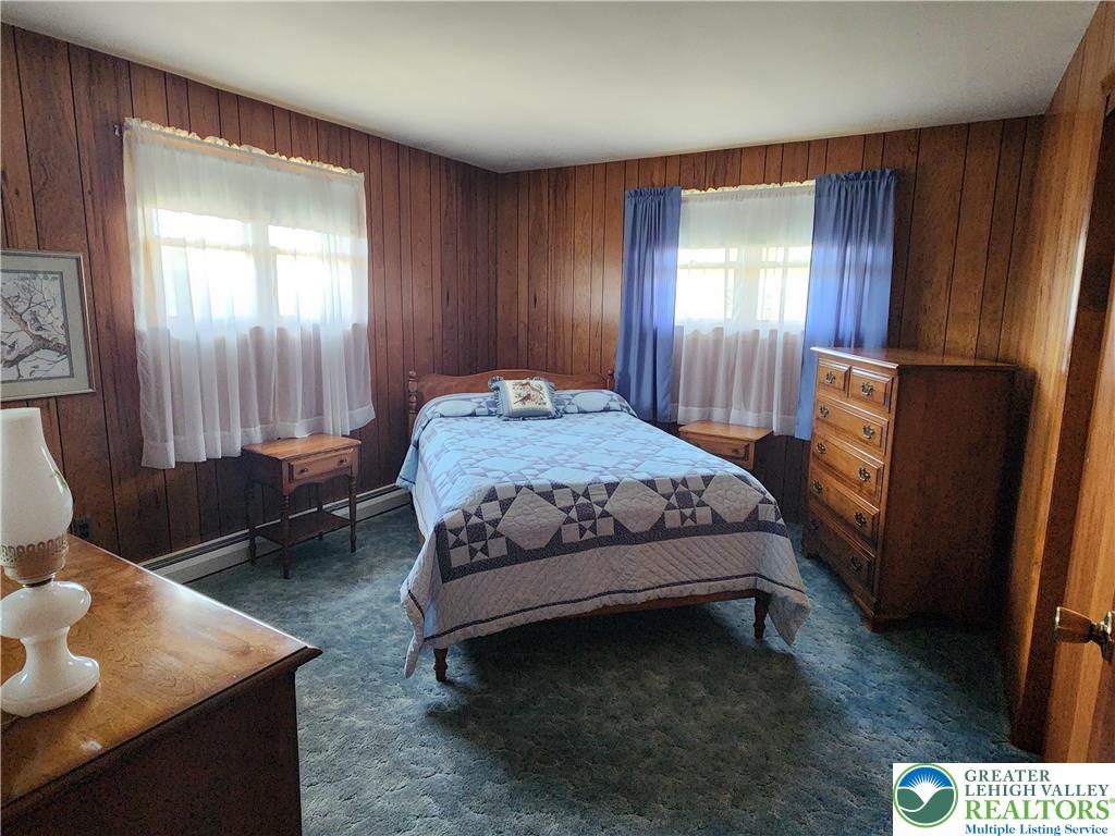 90 Porter Street Nazareth, PA 18064 - Photo 6 of 19 a bedroom with a bed and a dresser next to a window