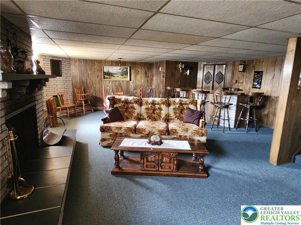 90 Porter Street Nazareth, PA 18064 - Photo 8 of 19 a living room with furniture and a flat screen tv
