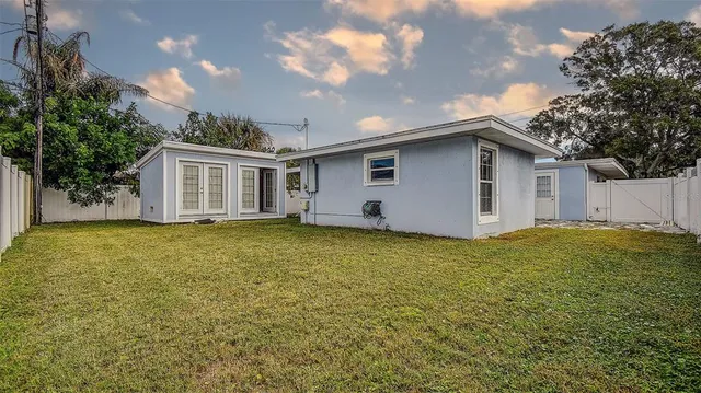 a bathroom with a sink and mirror