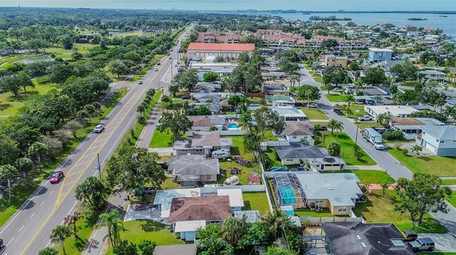 an aerial view of a city with lots of residential buildings