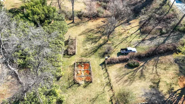 front view of a house with a rug