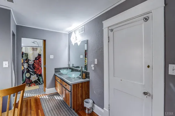 a view of balcony with furniture