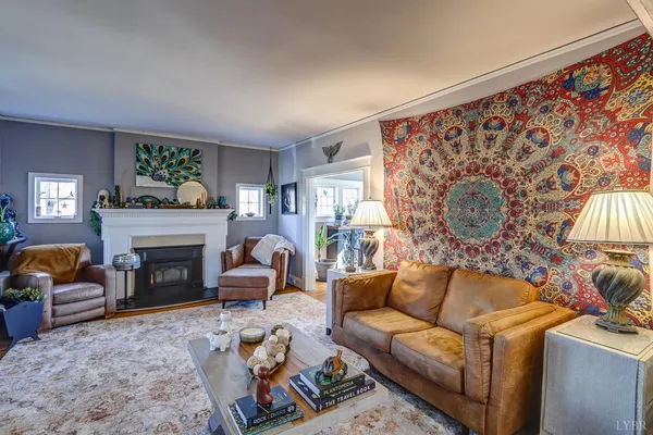 a white toilet sitting next to a bathroom sink and vanity
