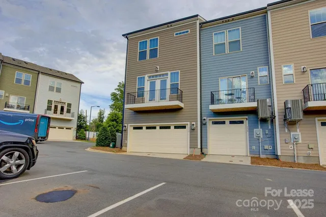 a car parked in front of a house