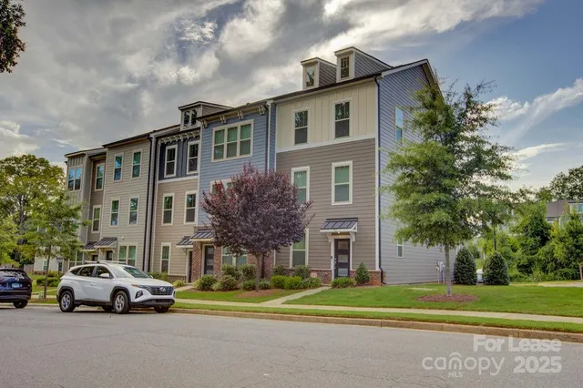 a view of street with parked cars