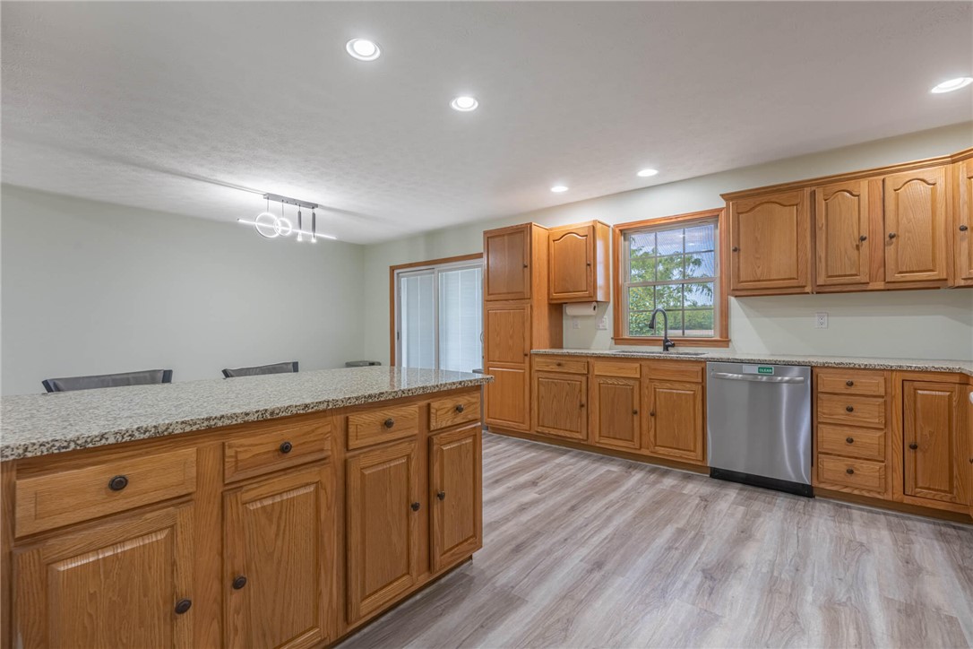2645 Vance Road St. Paris, OH 43072 - Photo 12 of 35 This spacious kitchen offers generous cabinetry, durable counters, and integrated appliances for comfortable daily living.