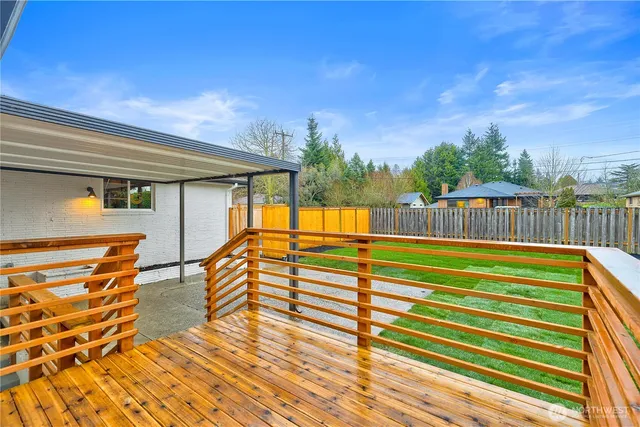 a view of a balcony with furniture