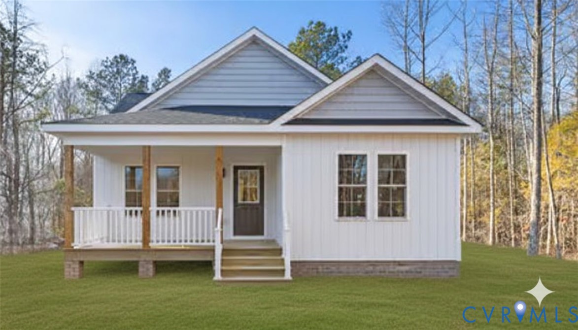 320 Vogel Road Cumberland, VA 23040 - Photo 2 of 28 a view of a house with a yard