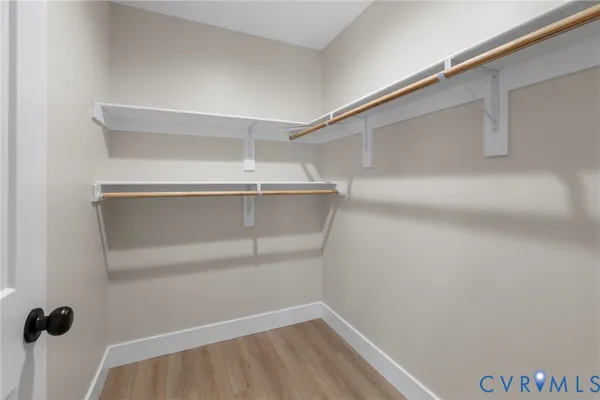 a view of an empty walk in closet
