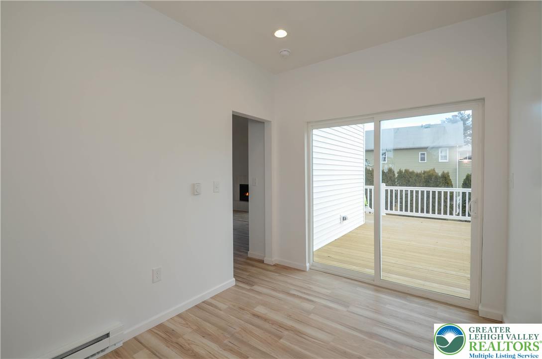2 Elm Street Mount Pocono, PA 18344 - Photo 15 of 44 an empty room with wooden floor and windows