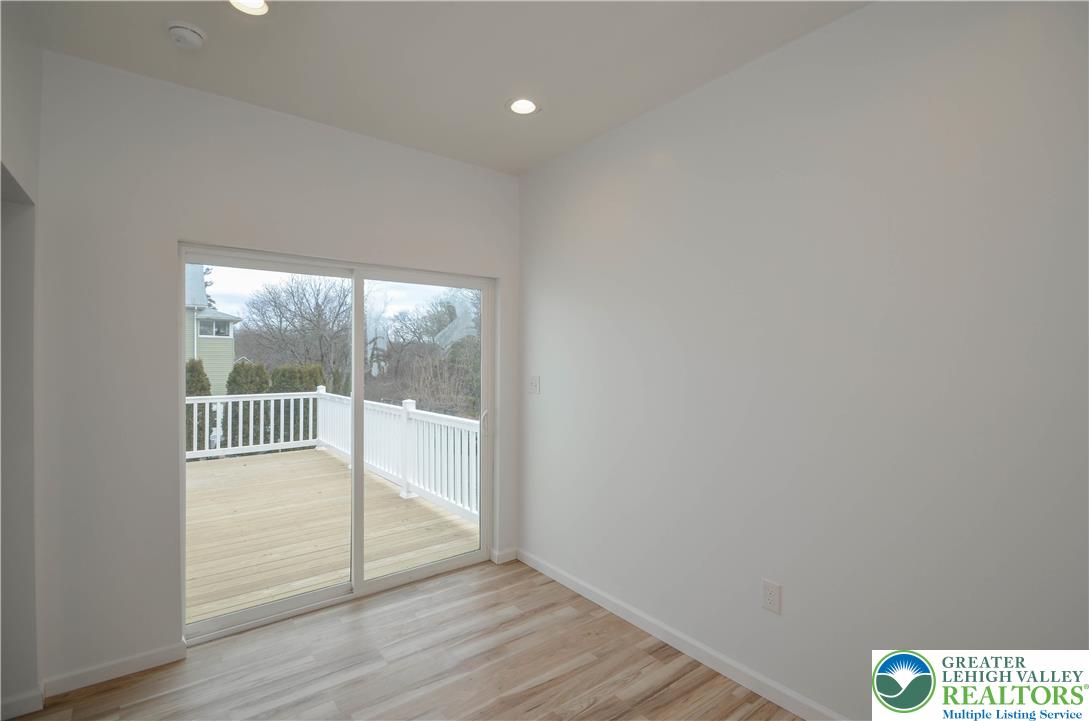 2 Elm Street Mount Pocono, PA 18344 - Photo 16 of 44 a view of an empty room and wooden floor