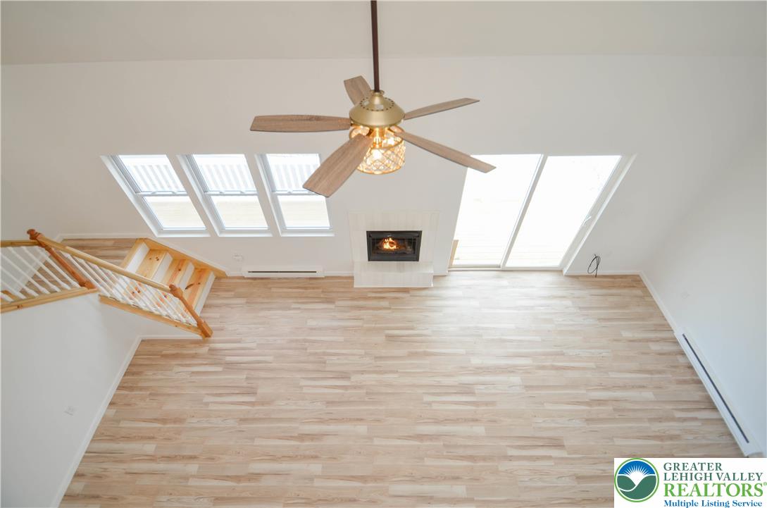 2 Elm Street Mount Pocono, PA 18344 - Photo 23 of 44 a view of a livingroom with a ceiling fan and window