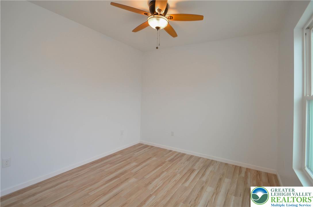 2 Elm Street Mount Pocono, PA 18344 - Photo 24 of 44 a view of a room with wooden floor fan and a window
