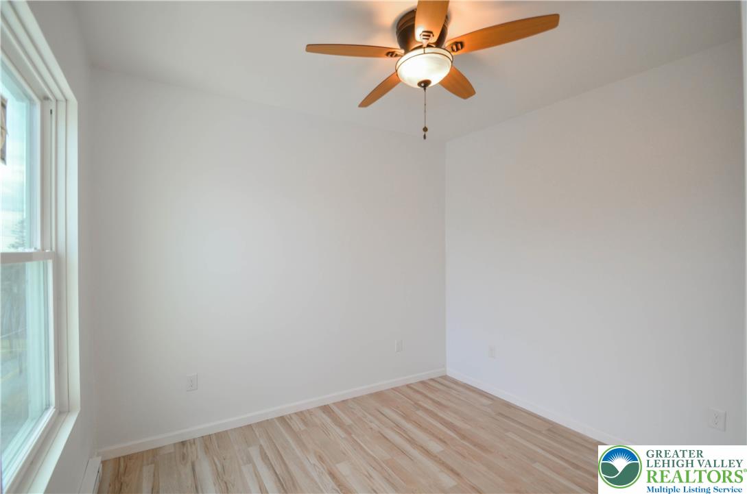 2 Elm Street Mount Pocono, PA 18344 - Photo 31 of 44 an empty room with a window and a fan