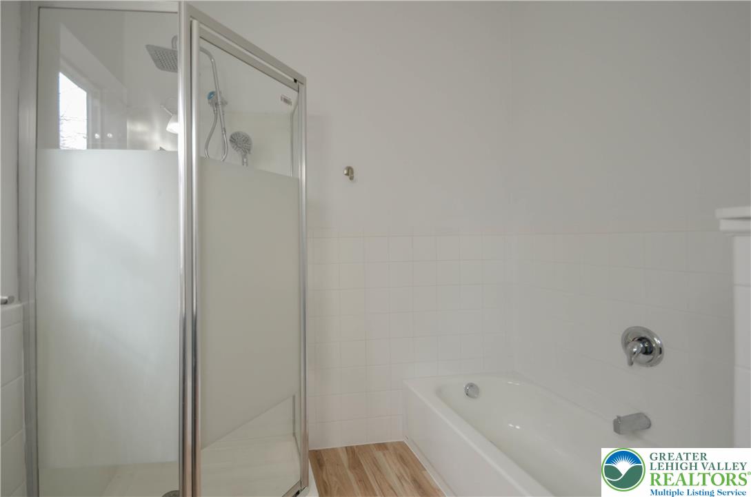 2 Elm Street Mount Pocono, PA 18344 - Photo 33 of 44 a bathroom with a bathtub and shower