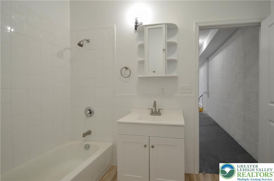 2 Elm Street Mount Pocono, PA 18344 - Photo 38 of 44 a bathroom with a sink a toilet and shower