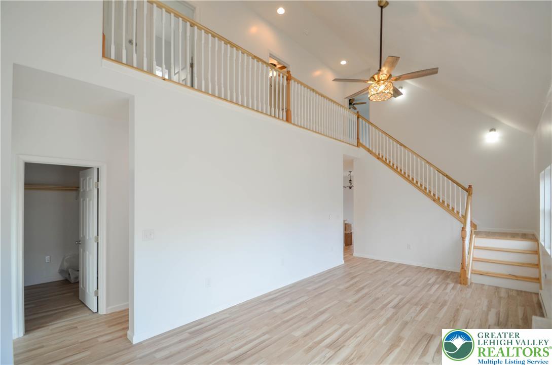 2 Elm Street Mount Pocono, PA 18344 - Photo 4 of 44 a view of a hallway with wooden floor and staircase